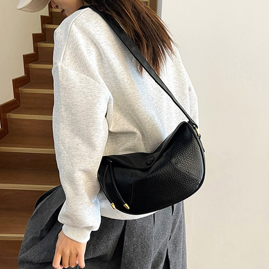 Minimalistische Schultertasche mit verstellbarem Riemen